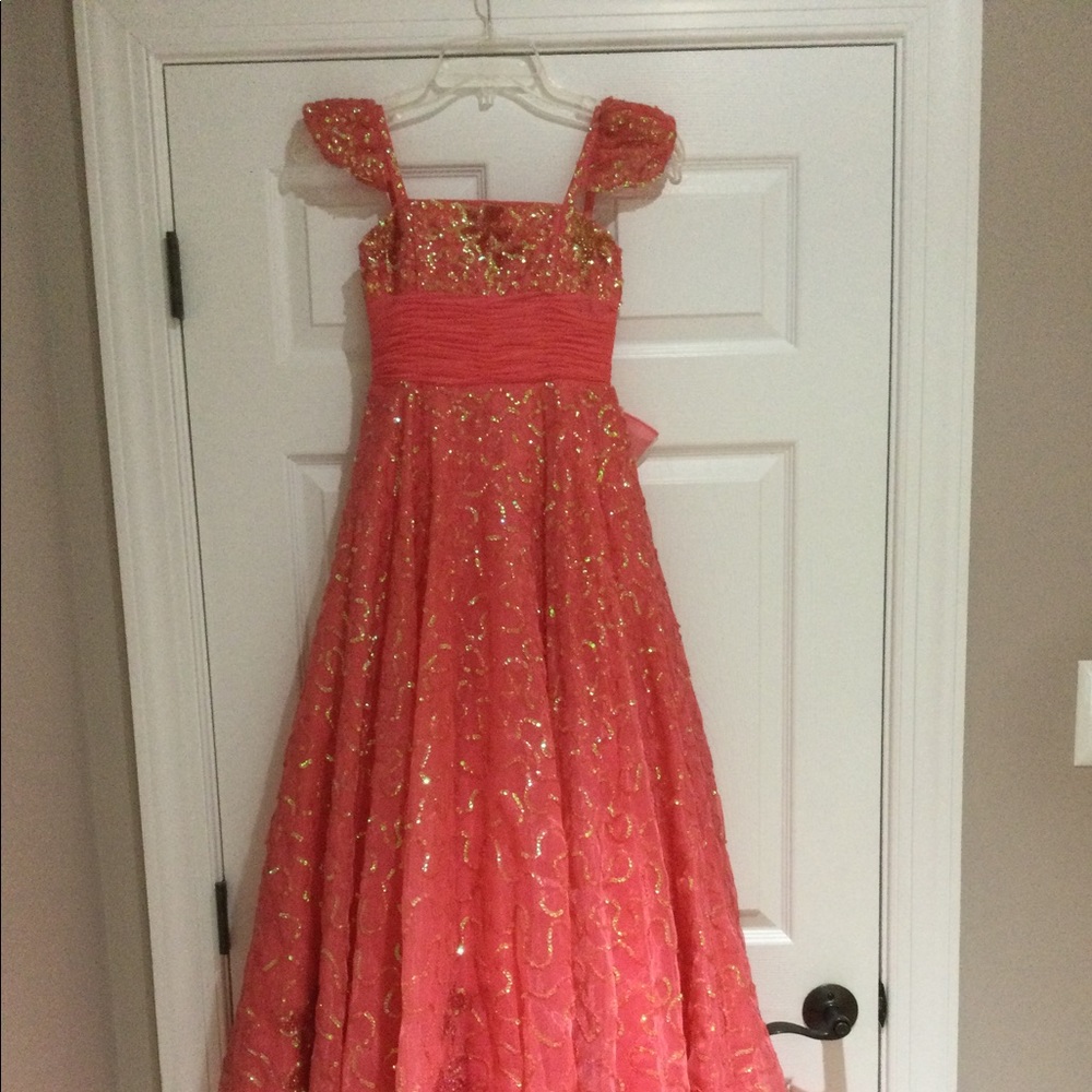Coral sequined Sherri Hill pageant gown